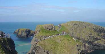 The crowds start to come back across the Carrick-a-Rede Rope Bridge.