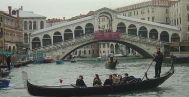 A Gondola and the Rialto Bridge.