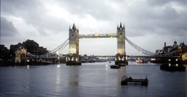 Tower Bridge as night nestles London.