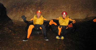 Sam and Eric prepare for black water rafting.