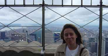 Sam atop the Empire State Building looking over Central Park.
