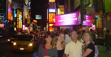 Passing through Times Square at night.