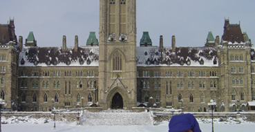 Sam shivers while listening to the Canadian capital bell tower.